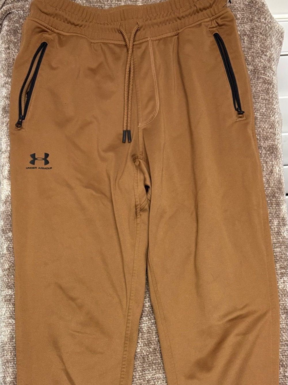 Under Armour Sportstyle Joggers, likely in a "Sahara" or "City Khaki" colorway